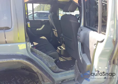 2015 Jeep Wrangler Unlimited Rubicon из США, поврежденный, VIN 1C4BJWFG3FL605313